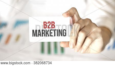 Businesswoman Holding A Card With Text B2B Marketing