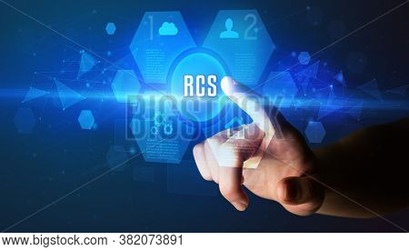 Hand touching RCS inscription, new technology concept