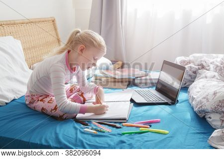 School Girl Child Learning Online On Laptop Internet At Home. Virtual Video Class Lesson During Self