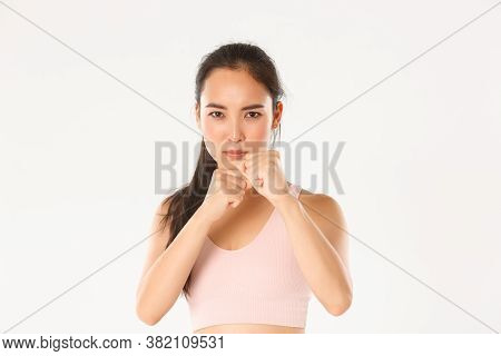 Sport, Wellbeing And Active Lifestyle Concept. Close-up Of Focused, Serious Asian Girl In Fitness Cl