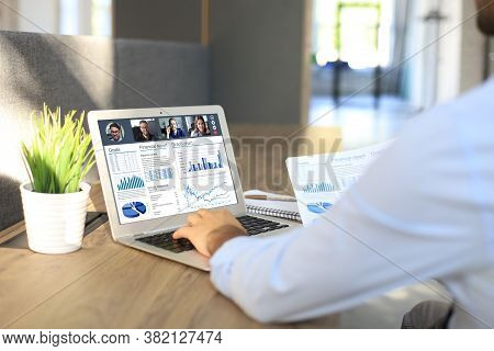 Businessman Speak Talk On Video Call With Colleagues On Online Briefing During Self Isolation And Qu