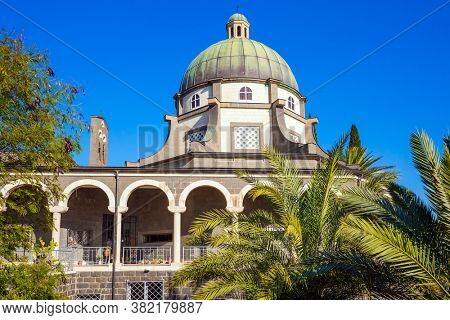 The Sea of Galilee. Blooming huge park around the monastery. Israel. The Catholic Church of the Beatitudes of the Italian Franciscan monastery on Mount Bliss. The concept of religious pilgrimage 