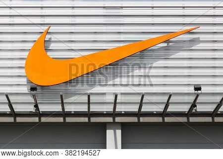 Bremen, Germany - July 2, 2017: Nike Logo On A Facade Of A Store. Nike Is An American Company Specia