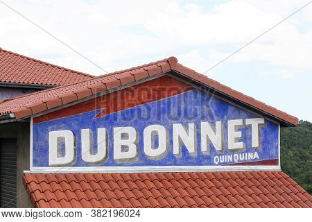 L'arbresle, France - June 27, 2020: Old Advertising Of Dubonnet Beverage On A House In France. Dubon