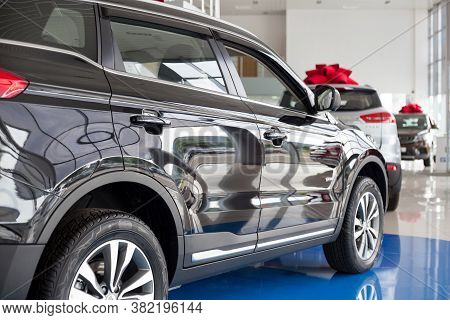 Russia, Izhevsk - August 14, 2020: New Modern Car Atlas In The Geely Showroom. Back View.
