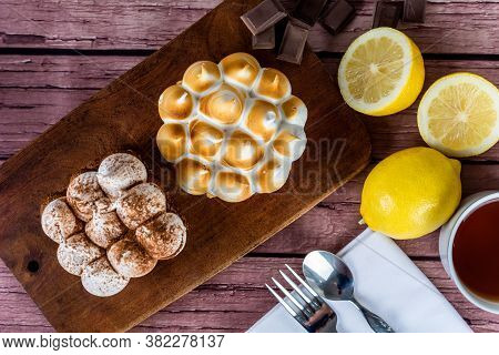 Mini Chocolate And Lemon Pie Cake With Cup Of Tea.
