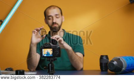 Professional Photographer Talking About Nd Filters Effect On Image For His Vlog.variable Nd Filter R
