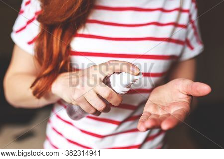 Women Washing Hands With Antibacterial Sanitizer Gel. Hygiene Concept. Prevent The Spread Of Germs A