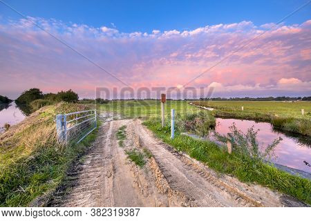 Pink Sunset Over Dutch Nature Reserve Onlanden In Drenthe, Netherlands