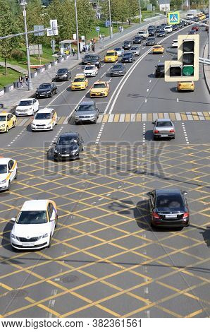 Traffic Organization. Nno Parking Yellow Cross Zone Sign On The Road, Asphalt Surface. Junction Box.