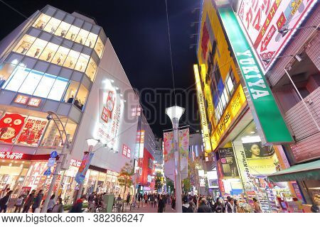 Tokyo, Japan - November 29, 2016: People Shop Attokyo City Ikebukuro District At Night. Tokyo Is The