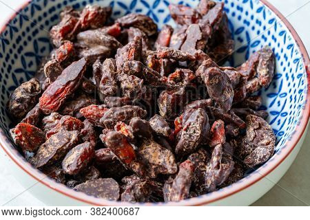 Bitter Chocolate Covered Goji Berries / Berry. Healthy Raw Organic Wolfberry Snacks.