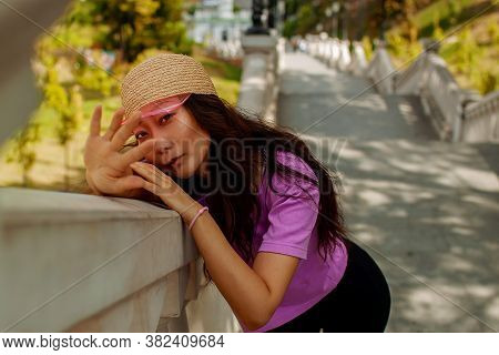 Sport Chic Style. Fitness Sport Girl In Fashion Sportswear Doing Yoga Fitness Exercise In Street.