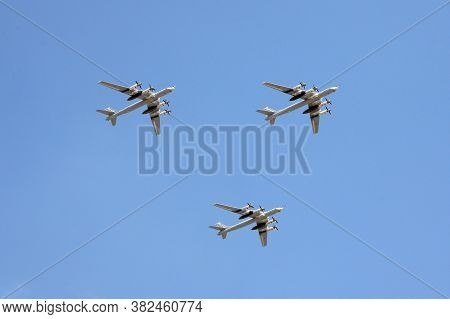 Moscow, Russia - June 20, 2020: A Group Of Tu-95ms Turboprop Strategic Bombers In The Sky Over Mosco
