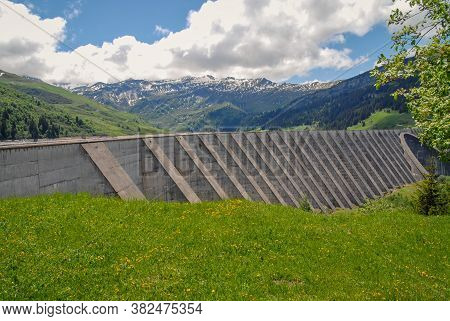 Weir And Lake Of Roselend, In French Alps