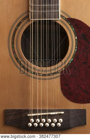 Detail Of The Body Of A 12-string Guitar, Vertical Shot