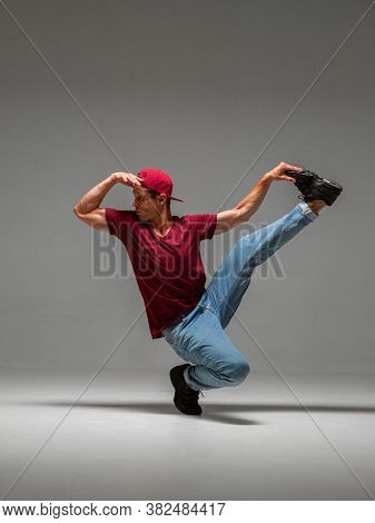 Cool Guy Breakdancer Dancing Lower Break Dance Isolated On Gray Background. Break Dance Lessons