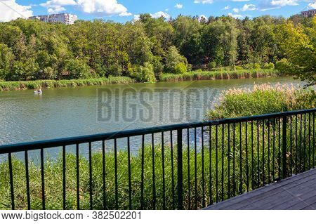 View Of Park And Lake From The Bridge . Rose Valley Park In Chisinau