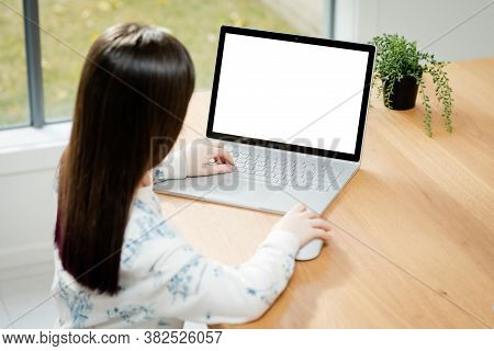 Placeit - Child Uses A Computer For School Work