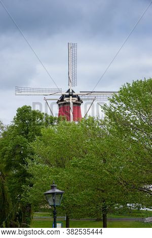 Windmill In Leiden, Netherlands Decorated With The Dutch Flag