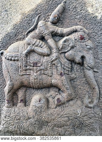 God Riding In An Elephant Sculpture. Bas Relief Sculpture Carved In The Stone Walls Of Shiva Temple,