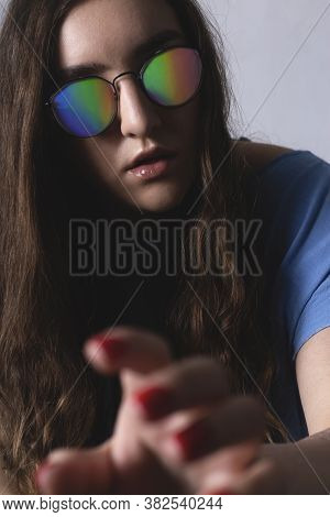 Millennial Woman Wearing Halographic Glasses. Augmented Reality Concept.