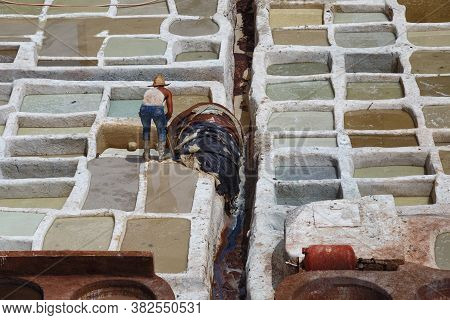 Unknown Woker In The Tannery In Fez, Morocco. The Tanning Industry In The City Is Considered One Of 