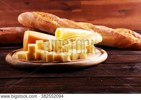 Different Sorts Of Cheese. Cheese Platter With Different Cheese And Spice