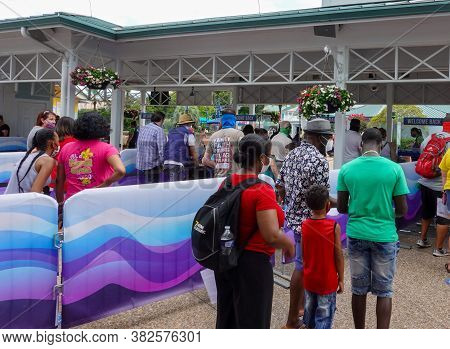 Orlando,fl/usa- 6/19/20:   People Going Through Ticketing At Seaworld  In Orlando, Florida Wearing F