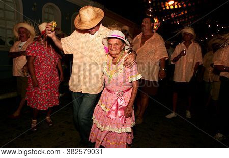 Porto Seguro, Bahia / Brazil - June 23, 2010: People Are Seen Dancing Forro And Hillbilly Dresses Du