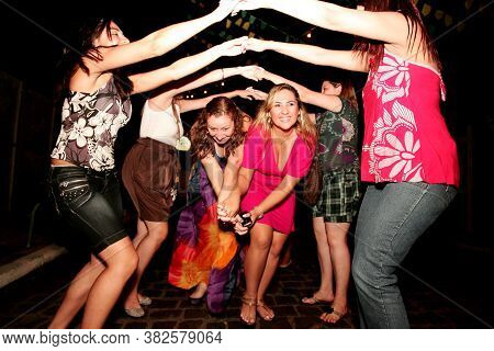 Porto Seguro, Bahia / Brazil - June 23, 2010: People Are Seen Dancing Forro And Hillbilly Dresses Du