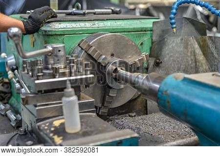 Tapping On A Lathe, The Tap Cuts The Hole By Applying Pressure From The Tailstock