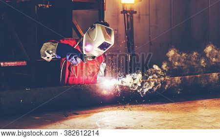 Pipe Welding On The Pipeline Construction,welders With Protective Equipment Welding Outdoors Pipelin