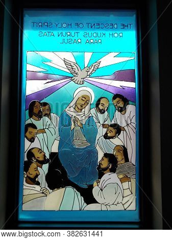 Medan, Sumatra, Indonesia, January 9, 2018: Window With The Image Of The Annunciation In The Graha M