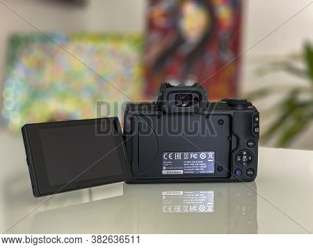 Frankfurt, Germany - 26th August 2020: A German Photographer Prepares His Old Canon Eos M50 With The