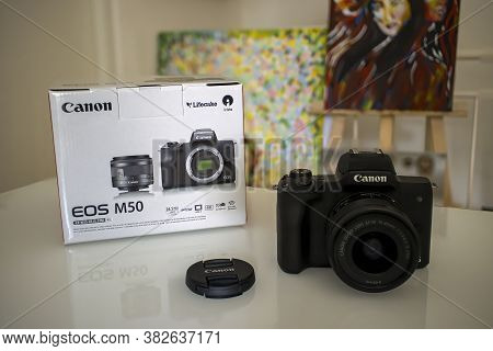 Frankfurt, Germany - 26th August 2020: A German Photographer Prepares His Old Canon Eos M50 With The