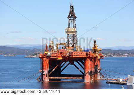Offshore Drilling Rig Maintenance In A Fiord Near Bergen, Norway. Oil Industry Structure.