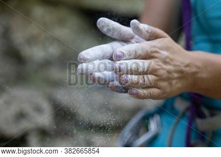 Female Hands With Magnesium. Rock-climbing And Active Leisure Concept