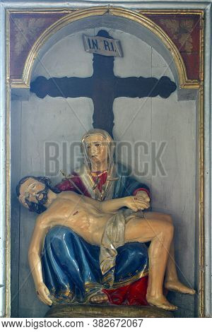 PETROVINA, CROATIA - JULY 22, 2013: Altar of Our Lady of Sorrows in the Parish Church of Saint Peter in Petrovina, Croatia