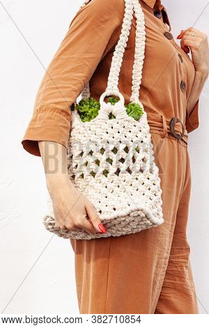 Girl Is Holding Mesh Shopping Bag With Vegetables, Greens Without Plastic Bags. Zero Waste, Plastic 