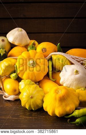 Fresh Harvest Of Zucchini And Pattison, Yellow Squash And Pattison And Pepper On Wooden Background