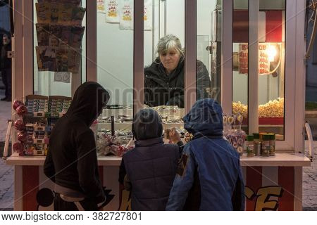 Novi Sad, Serbia - February 13, 2016: Group Of Youngsters, Boys, Serbs, Waiting In Line In The Stree
