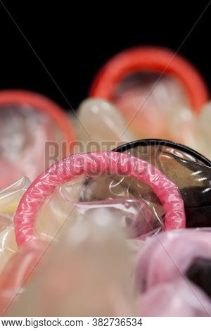 Group Of Latex Condoms Of Different Colors, Condoms Are Not In The Package, Made Of Natural Latex