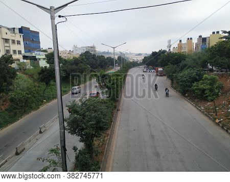 Beautiful View Of Laggere Ring Road From The Bridge With Cityscape And Sky Background