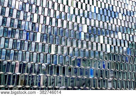 Reykjavik, Iceland - July 21, 2019: Detail Of The Glass And Steel Construction Of The Harpa Hall, A 