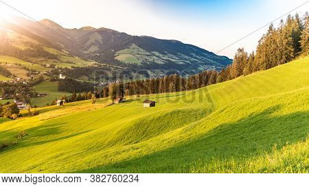 Romantic Sunset In The Mountains. Green Alpine Meadows And High Peaks Of Austrian Alps. Salzach Rive