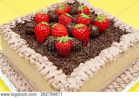 Delicious Traditional Brazilian Chocolate Cake Called Bolo De Brigadeiro With Fresh Strawberry Toppi