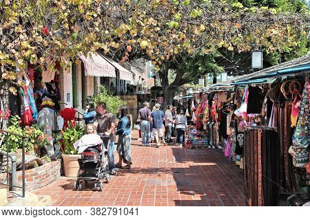 Los Angeles, Usa - April 5, 2014: People Visit Olvera Street Market In Los Angeles. Olvera Street Is