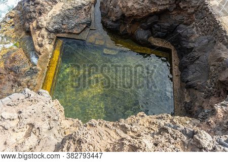 Natural Sea Pool In The Cove Of Puerto De Puntagorda, Island Of La Palma, Canary Islands. Spain