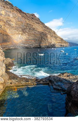 Natural Sea Pool In The Cove Of Puerto De Puntagorda, Island Of La Palma, Canary Islands. Spain